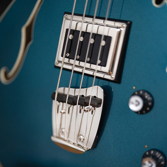 Top down view of the back of the Starfire Deluxe Bass Teal the Deal thumb