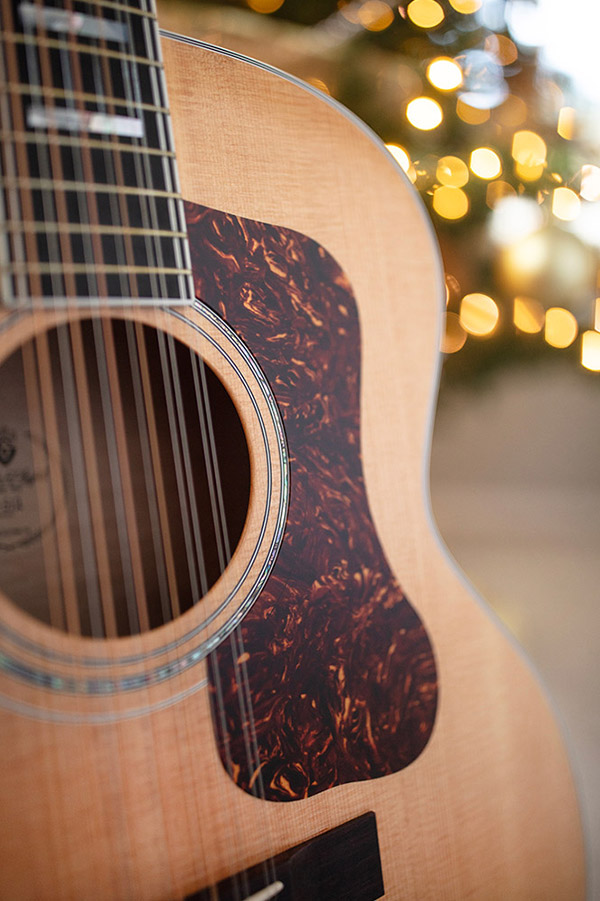 Close up of Guild F-512 Maple Blonde soundhole and pickguard thumbnail