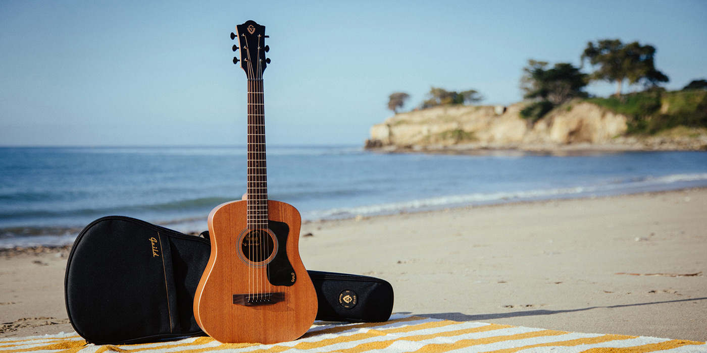 Travel Mahognay with included gig bag at the beach